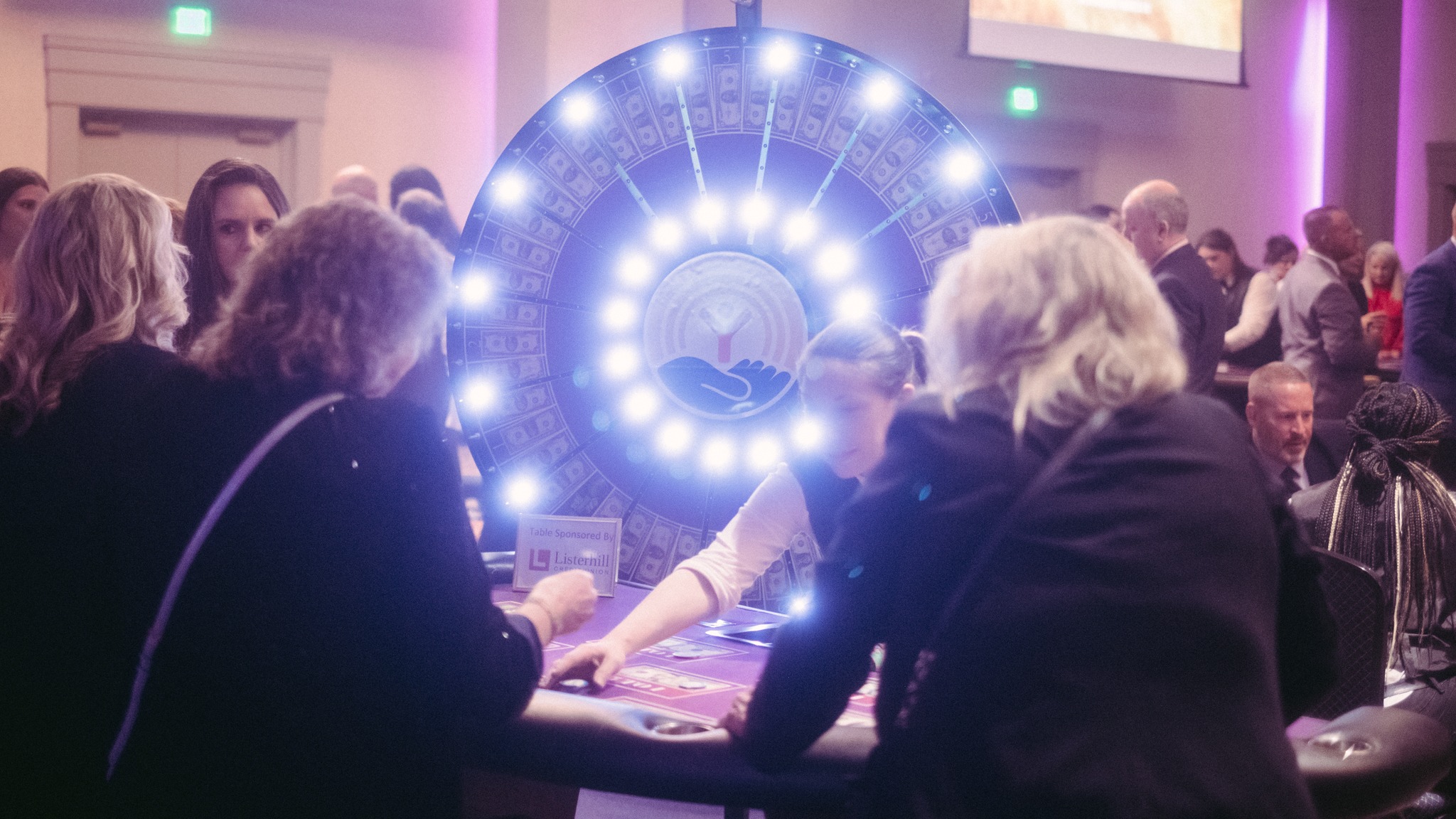 Guests playing the Casino Knight prize wheel game